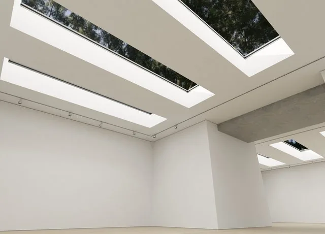 Looking-up render of deep skylight wells with treetops visible through the glass